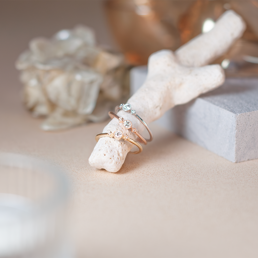 Mini beads tri-stone diamond ring